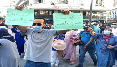 غاضبون على اجبارية التلقيح وجوازه يدعون عبر مواقع التواصل الاجتماعي إلى مسيرة مليونية